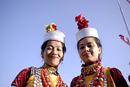 Khasi girls in traditional dress smiling at the camera